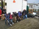 Community Connections board members shovel gravel at a ground breaking ceremony in Ketchikan for the Opportunity House, an eight unit apartment complex for individuals with disabilities.
